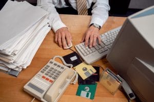 vintage 90 s style office with person working desk